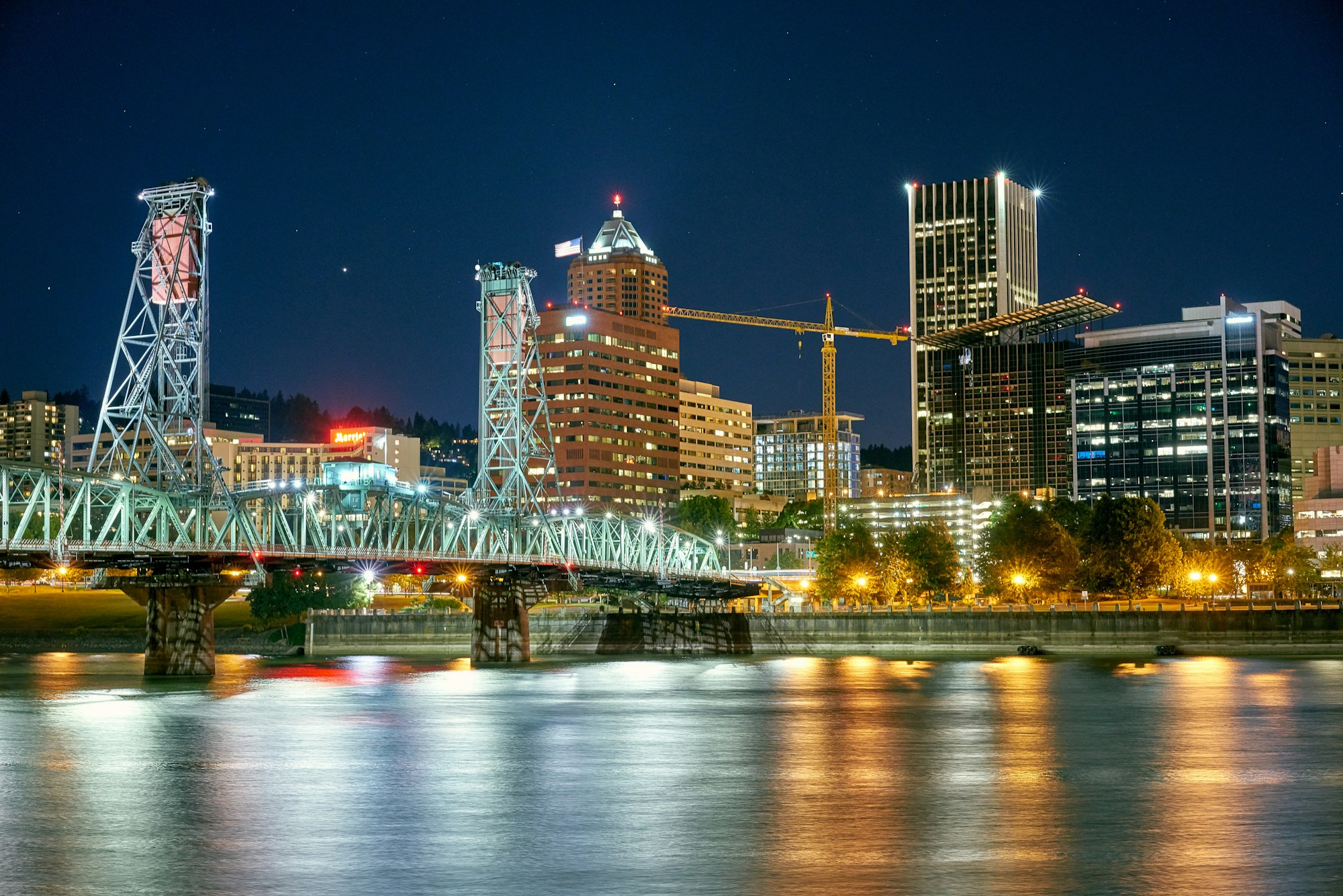 Portland’s skyline and a bridge over the Willamette River at night